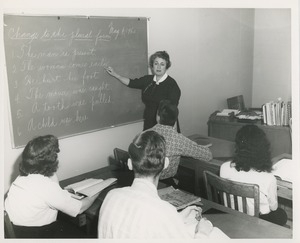 ICD instructor teaching grammar to an academic class of four students