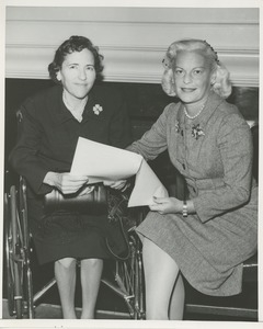 Margaret Milbank Bogert and Mrs. John C. Wilmerding reviewing paperwork