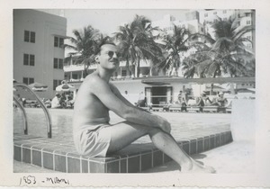 David Kahn seated poolside