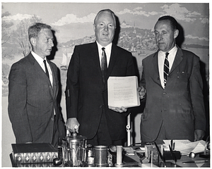 Two unidentified men and Mayor John F. Collins