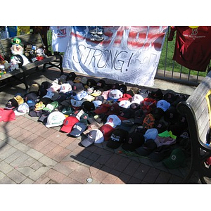 Collection of hats at Boston Marathon Copley Square memorial
