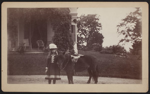 Unidentified girl with a pony