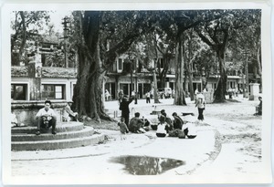 Park, people, and vendors in Old Quarter