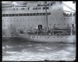 Woodrow Wilson's return from the Paris Peace Conference: members of Wilson's entourage debarking from the George Washington onto the Coast Guard cutter Ossipee for transport to Commonwealth Pier in South Boston (copy image)
