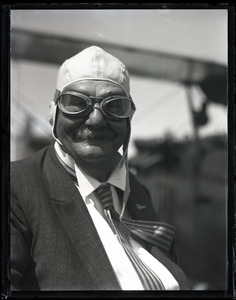 Edward Howland Robinson Green: portrait wearing leather flying helmet and goggles