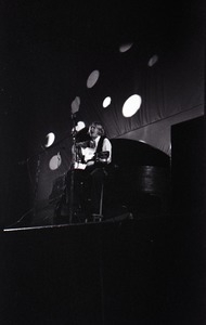 Unidentified female twelve-string guitar player in concert