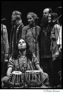 Tabla player performing with Amazing Grace at a Dharma Festival