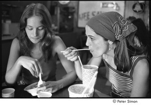 Ram Dass retreat at David McClelland's: Ronni Simon (left) and unidentified woman eating ice cream