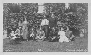 Members of the class of 1905 and others standing and sitting in front of Old Chapel