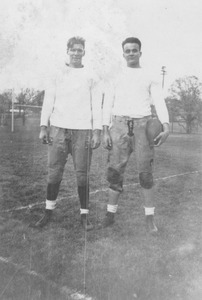 John Brady and teammate during football practice