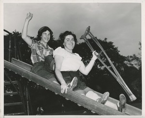 Two women on slide during annual outing