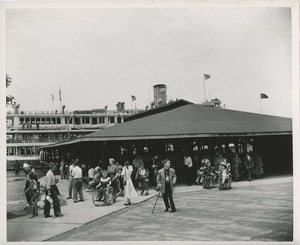 People leaving boat for annual outing at Playland