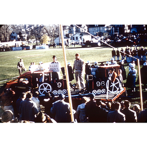 Homecoming parade float and marching band