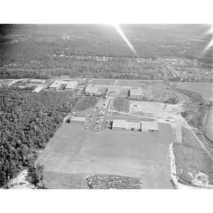 Suburban location of industrial buildings, some new construction, unidentified