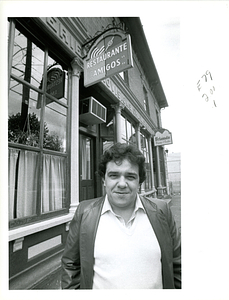 Jorge D'Ascensao in front of his restaurant, Amigos