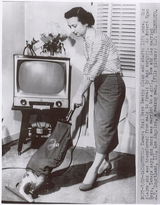 Tamara Rees Vacuuming at Home (July 28, 1955)