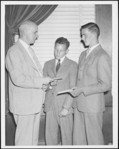 Two students receive scholarship awards from Suffolk University President Gleason L. Archer (1906-1948)