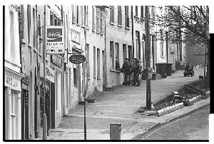 British Army search for explosives in Irish Street, Downpatrick. British soldiers using an army robot search for explosives while other soldiers guard the search team. Includes some shots taken the night before when the street was first sealed off