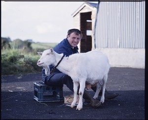 John Carson, Unionist Lord Mayor of Belfast, milking his goat at his Co. Down home