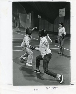 Flynn Student Recreation Complex interior: students fencing