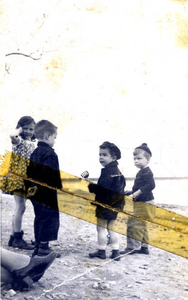 Cary Holmes holding spatula on the beach in Squantum, MA 'Looking For German Subs' (age 3)