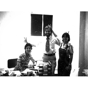 Jorge Hernandez with two Inquilinos Boricuas en Acción employees in an office.