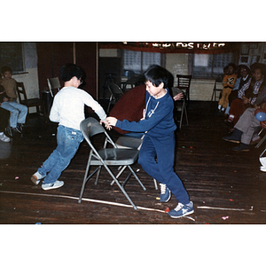 Children playing at Chinese Progressive Association anniversary event