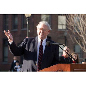 Neal Finnegan gestures as he speaks at the Veterans Memorial dedication