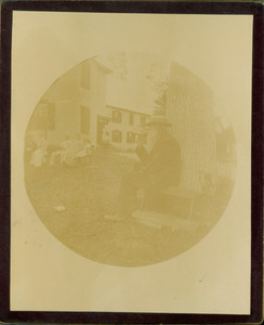 Richard Tucker seated under a tree, with Tucker family in background, Castle Tucker, Wiscasset. Maine, undated
