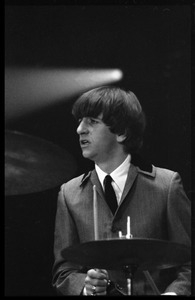 Ringo Starr on drums, in concert with the Beatles, Washington Coliseum