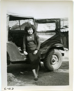 Young woman with jeep