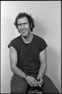 Studio portrait of Richard Safft, seated on a stool