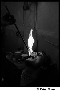 Fire eater, practicing his craft