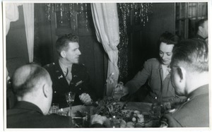 Visitors at Office of Military Government Officers' Mess: (left to right) John J. Maginnis (back to camera), Frank L. Howley, Nearing