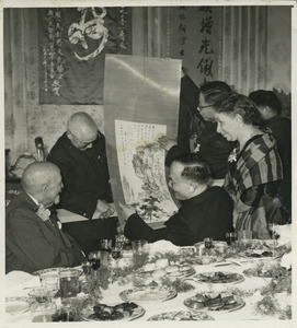 Chinese dignitaries offering a gift to W. E. B. Du Bois