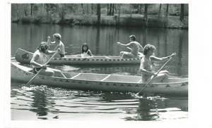 Students riding in canoes at Freshman Camp