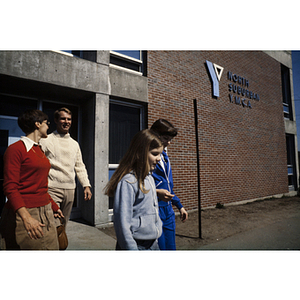 Family exiting the North Suburban YMCA