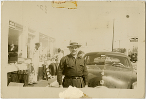 George W. Rose smiling, in hat