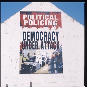 Political policing mural. On roadside, somewhere in Co. Down