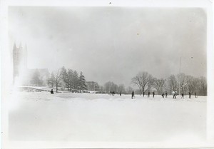 Alumni Field as ice rink with Gasson Hall in background