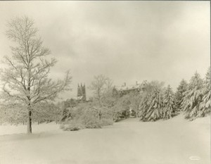 Gasson Hall and Saint Mary's Hall from reservoir in winter, by Clifton Church