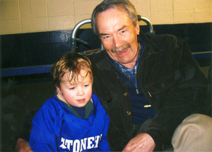 Conor and his grandpa at hockey