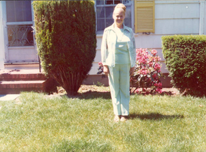 Alice McCarthy in front of her home on Dickens Street