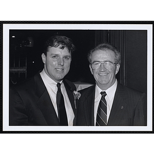 Two men posing at a St. Patrick's Day Luncheon