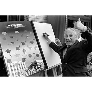 Studs Terkel signs a giant card at Cooperative Education's 75th anniversary celebration