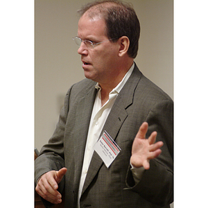 Peter Barrett, PhD '79, speaks at the NU Today Cancer Research Panel