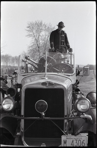 Fire fighters in a firetruck