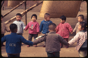 General Petrochemical Works -- children in circle, colorful clothes