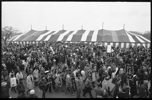 Giant tent pitched on the National Mall with Committee of Returned Volunteers (CRV) and other anti-war protesters milling about: Counter-inaugural demonstrations, 1969