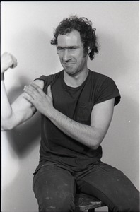 Studio portrait of Richard Safft, seated on a stool